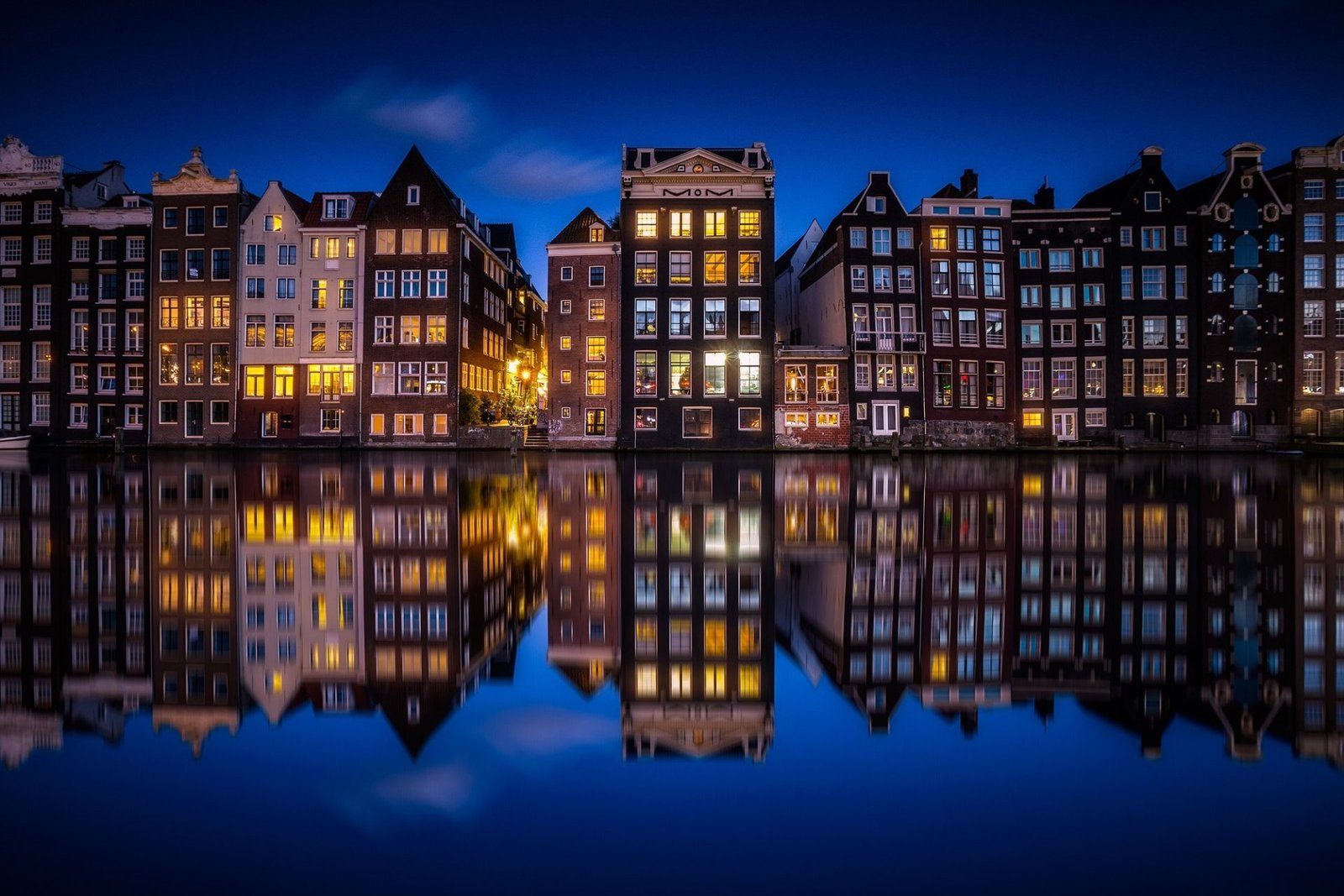 Amsterdam canals Netherlands city lights with reflections